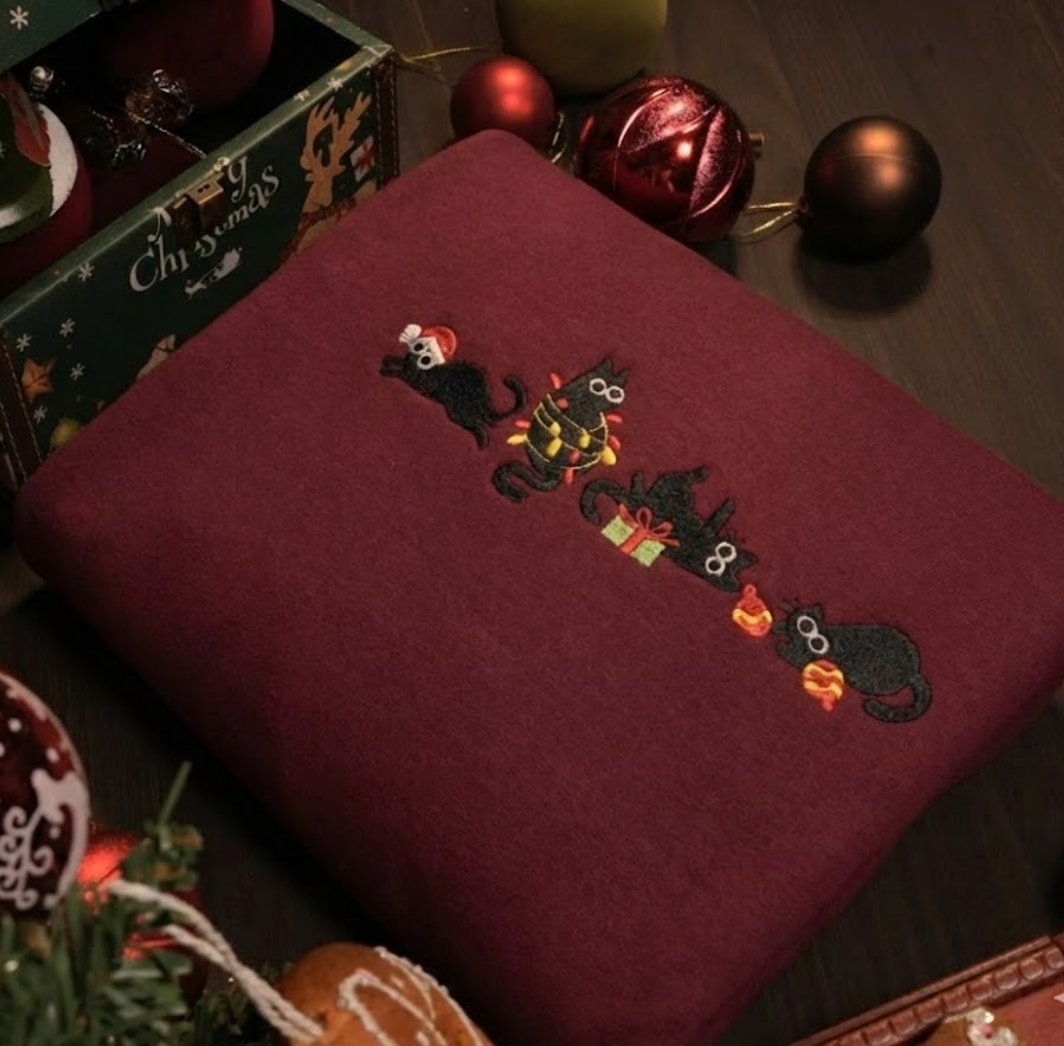 Áo Meowwy Christmas – Phiên bản Mèo Đen Giáng Sinh, tặng hình thêu cá nhân trên tay áo 🎄
